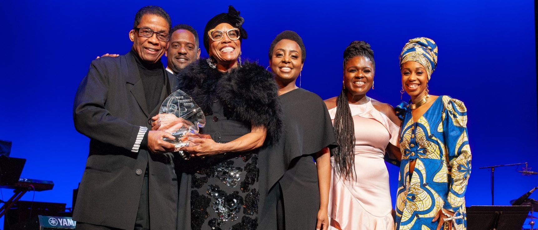 Institute Advisory Board member Dee Dee Bridgewater accepts the 2018 Maria Fisher Founder's Award with (from left) Herbie Hancock, Blair Underwood, Ledisi, Deborah Joy Winans and Jazzmeia Horn.